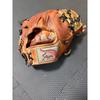 Used Kubota Slugger Hard Glove