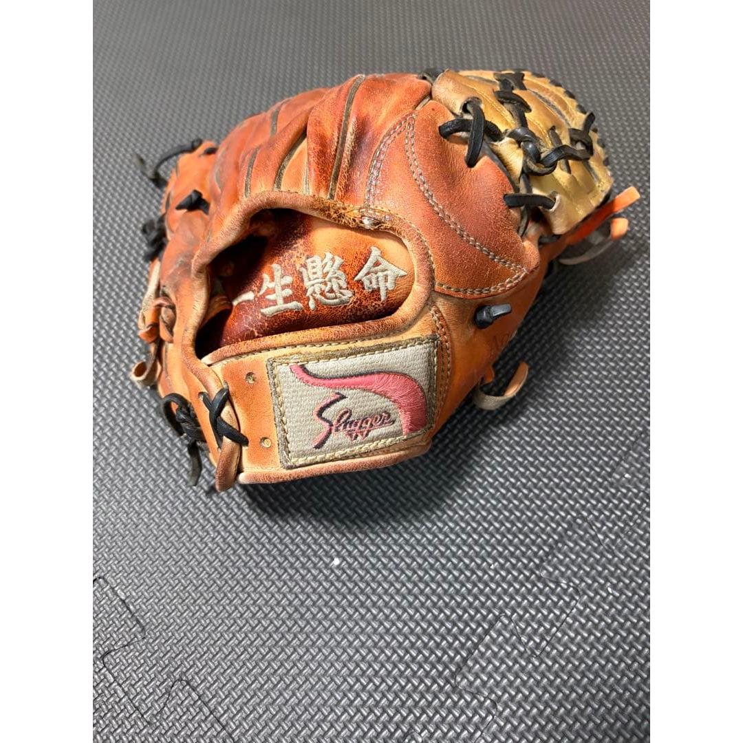 Used Kubota Slugger hard glove