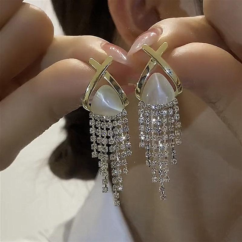 111 silver needle tassel opal stud earrings women s retro red light luxury niche high-end earrings temperament versatile earrings 925 silver needle