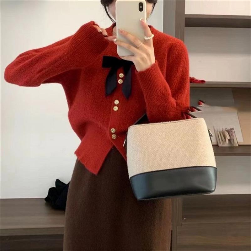 Xiaoxiangfeng gentle and sweet sweater cardigan women s 2025 autumn new bow round neck waist knitted top women one size fits all 5567₽