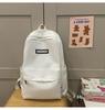 Elementary school bag, female junior high school student solid color backpack, high school student large capacity casual backpack fashion