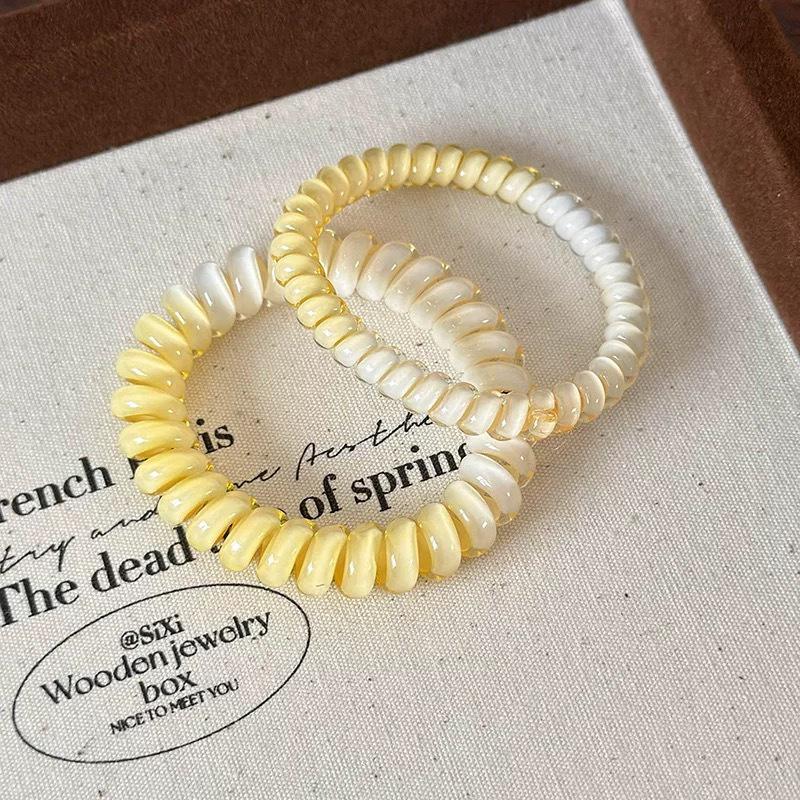 Elastic Hair Ties - No-Pull, Versatile & Stylish for 2024