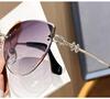 Women's Frameless Oval Metal Retro Sunglasses - High-End Japanese & Korean Fashion