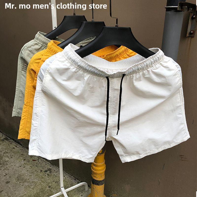 Pánské trendy rychleschnoucí plážové šortky Korejské barvy Candy Color