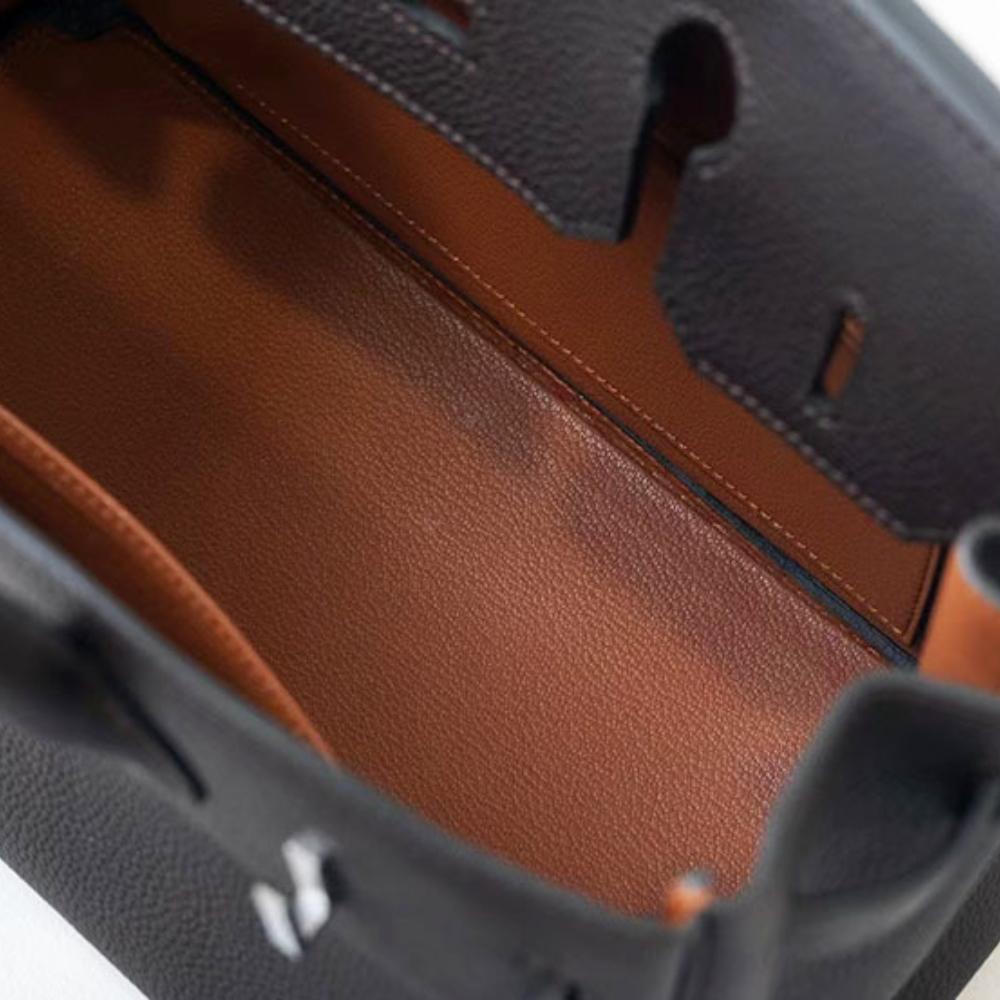 Høykvalitets spesiallaget semi-vokset tråd semi-håndsøm stålbeslag importert togo toppnarvet kuskinn håndveske med en følelse av luksus