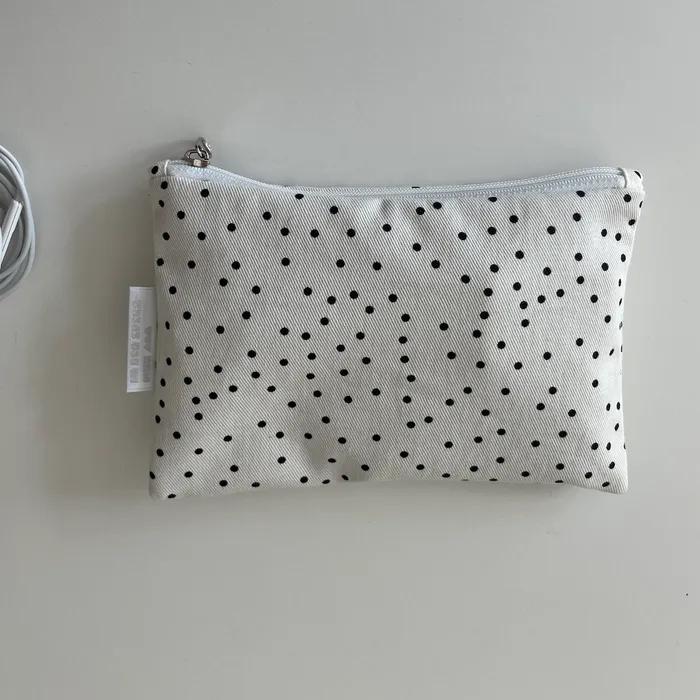 White polka dot pouch