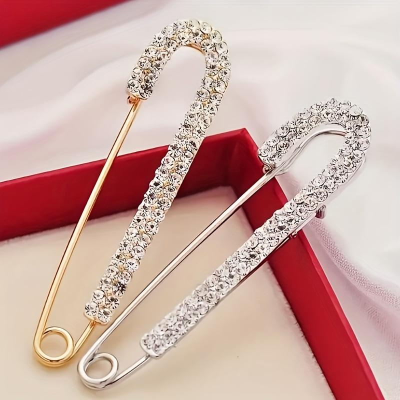 2pcs Fashionable delicate clothes button pin corsage, made of synthetic Zirconia and alloy. It is the waist circumference of the pants that is revised