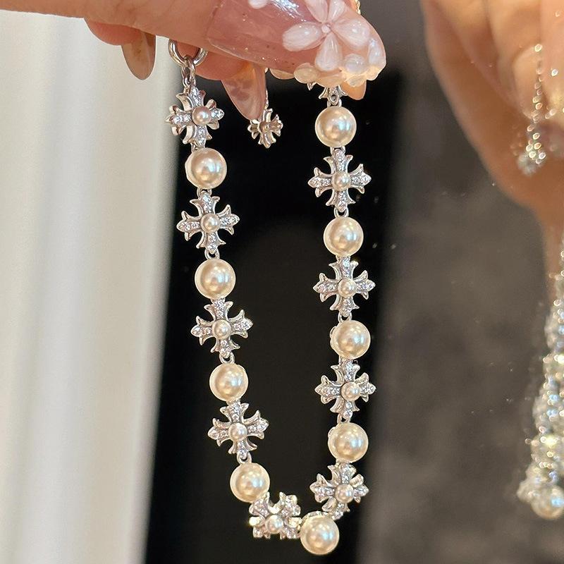 Hot Selling Sweet, Cool, Fashionable and Exquisite Pearl Cross Bracelet Pull-out Bracelet