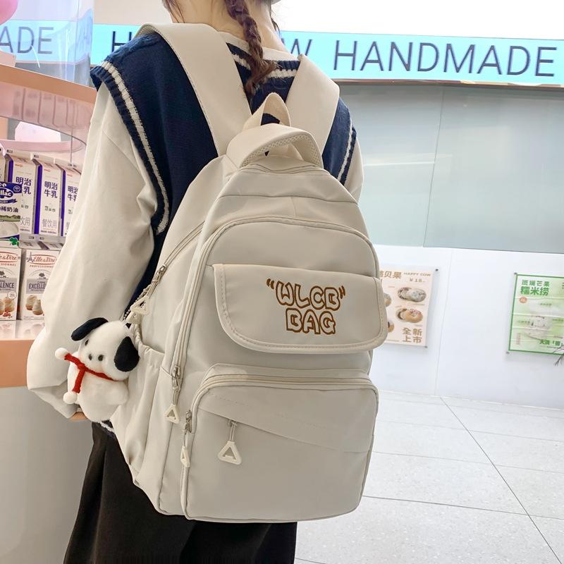 Student schoolbag 2023 new large-capacity alphabet backpack Korean version of junior high school backpack