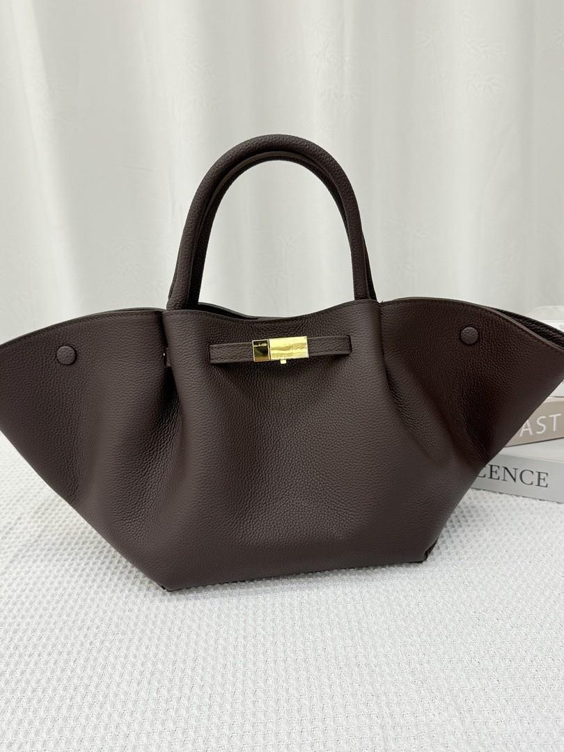 

Real Leather Hand-held Wing Bag Women From Factory Large Capacity Commuting Women s 52x16x21CM кавовий