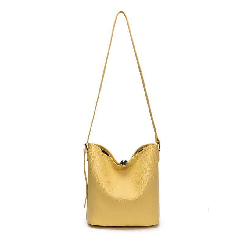 Spring and Summer Fashion Simple Style Niche Design Solid Color Bucket Bag Women's Daily Leisure Commuting Versatile Messenger Mother and Child Bag