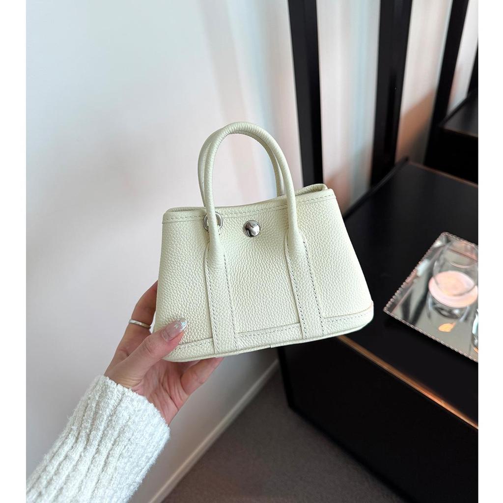Bolsa Transversal 2026 Lançamento Novo Sensação de Luxo Rosa e Branco Couro Bovino Camada Superior Mini Bolsa Jardim Para Mulheres Bolsa Simples Para o Dia a Dia