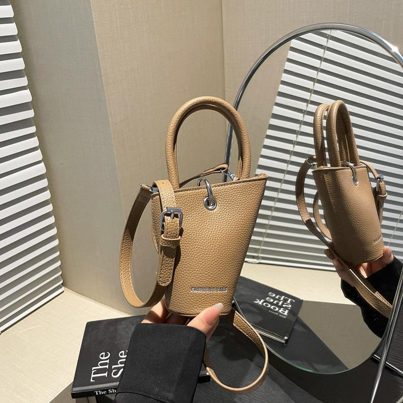 Niche design fashionable versatile hand bag women's summer new simple retro messenger bucket bag