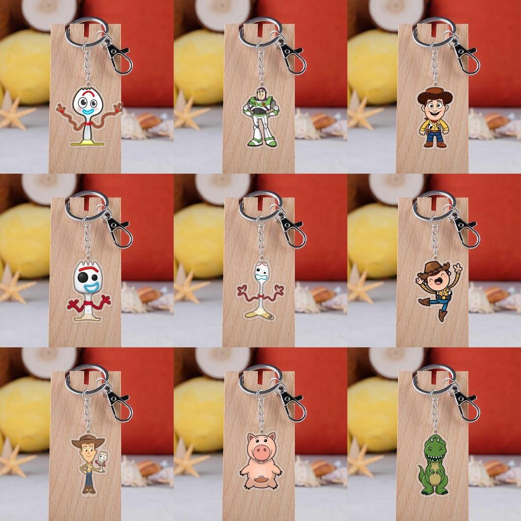 Entzückender Toy Story Acryl-Schlüsselanhänger mit Buzz Lightyear, Woody und Alien Design