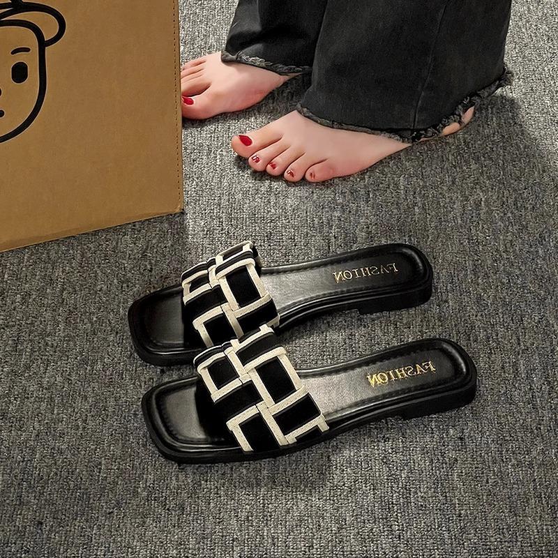 

Woven one-word cool slippers women s 2025 new outer wear fashionable flat bottom square head lazy person going out beach temperament niche 35