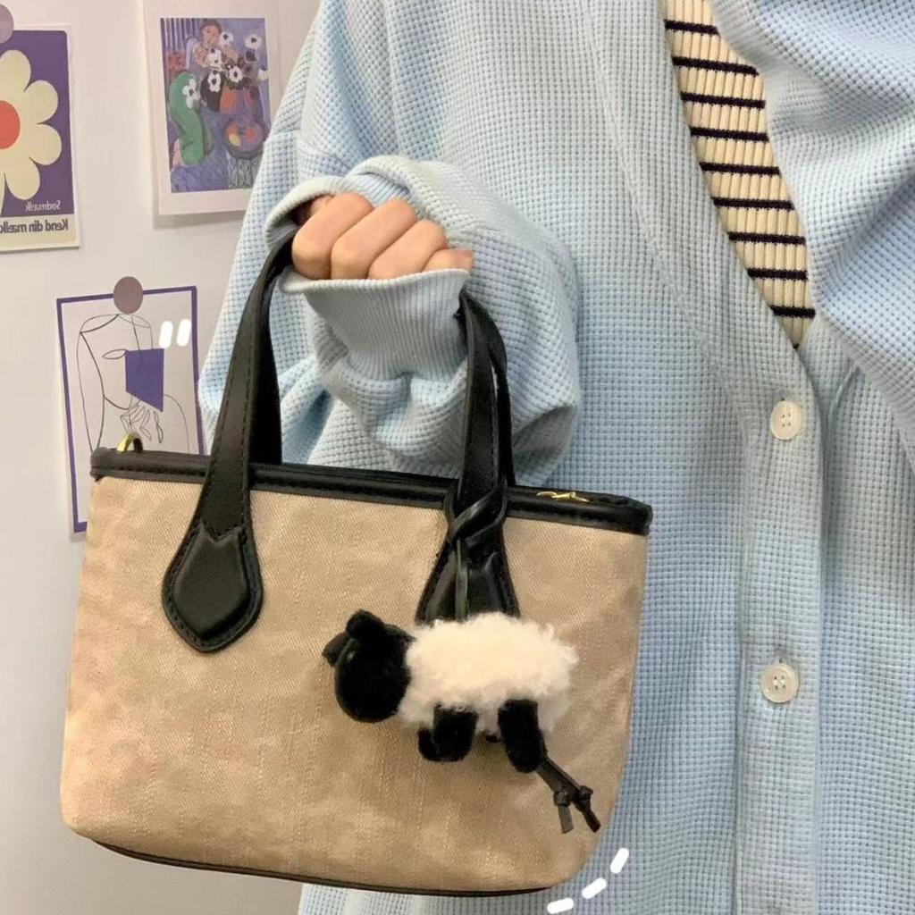 Portable bucket bag, women's retro spring popular vegetable basket bag, premium texture shoulder messenger bag