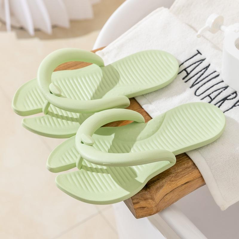 Spring and summer new product portable couple flip-flops women's home simple solid color beach travel hotel cool slippers