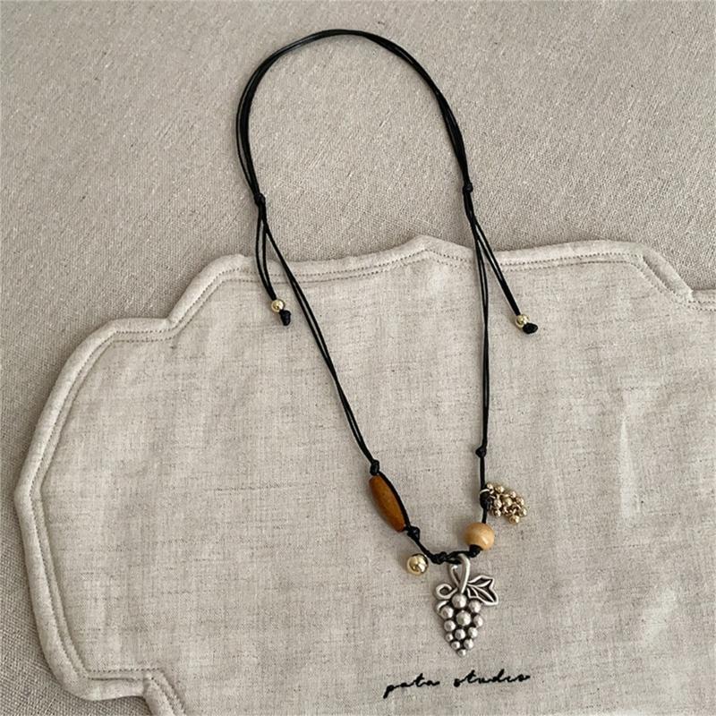 Stylish Alloy Accent Necklace With Sliding Closure Braided Cord and Natural Wood Materials