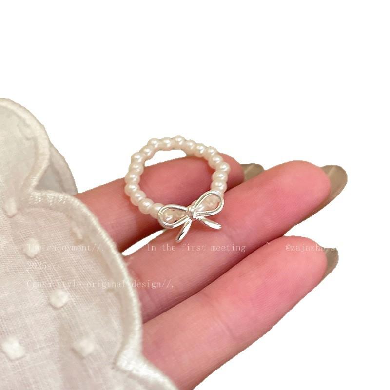 Bow pearl beaded ring women's ins niche design decorative open ring light luxury high sense stacked ring