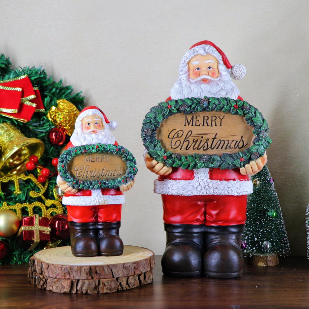 Santa Claus Resin Figurine with Merry Christmas Sign - Festive Home Decoration