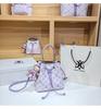 Women's Large Capacity Single Shoulder Bucket Bag with Inner Lining, Compartment Organizer, and Zippered Middle Section.