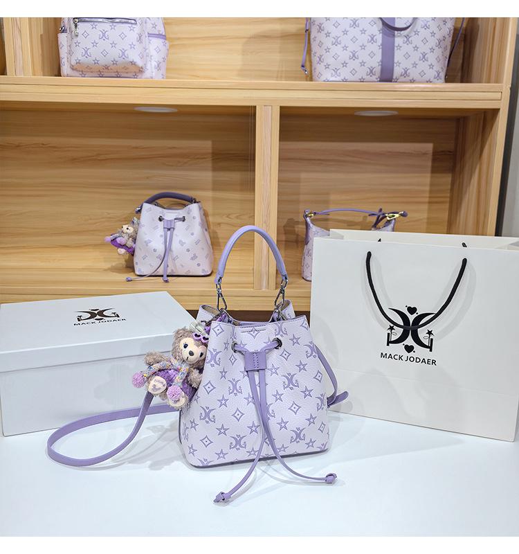 Women's Large Capacity Single Shoulder Bucket Bag with Inner Lining, Compartment Organizer, and Zippered Middle Section.