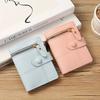 Compact Slim Wallet for Women Featuring Multiple Card Slots, a Zipper, And Button Closure