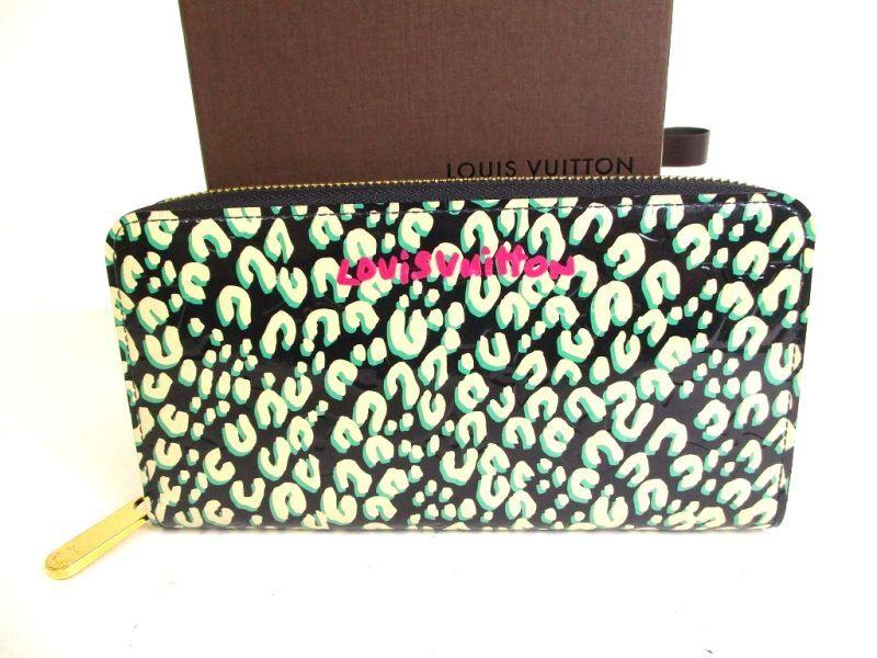 

Authentic LOUIS VUITTON Vernis Blue Leopard Patent Leather Round Zip Zippy Wallet #9314 Refurbished