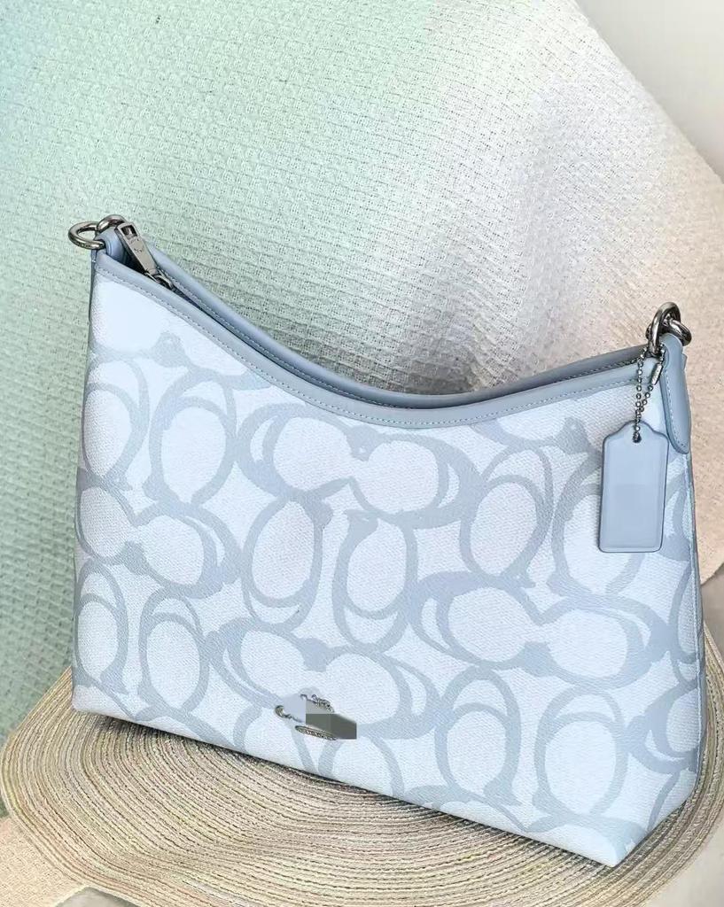 Coach Laurel Hobo Bag: Versatile, Large-Capacity Shoulder, Crossbody, and Handbag for Women.