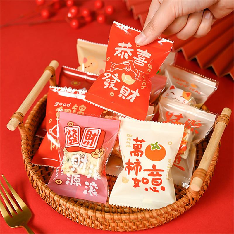 2026 Chinese New Year Snowflake Crispy Packaging 100Pcs 7x10cm Baking Cookie Machine Sealed Candy Bags