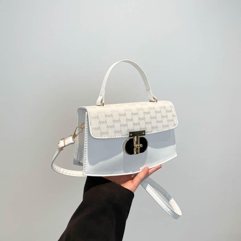 Simple texture lock 2025 trend design fashionable color matching texture oblique span shoulder portable small square bag women