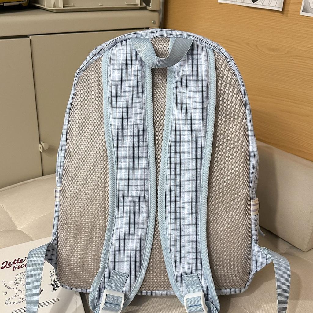 Schoolbag schoolbag junior high school girl 1011 new Japanese ins niche plaid student large capacity lightweight versatile backpack
