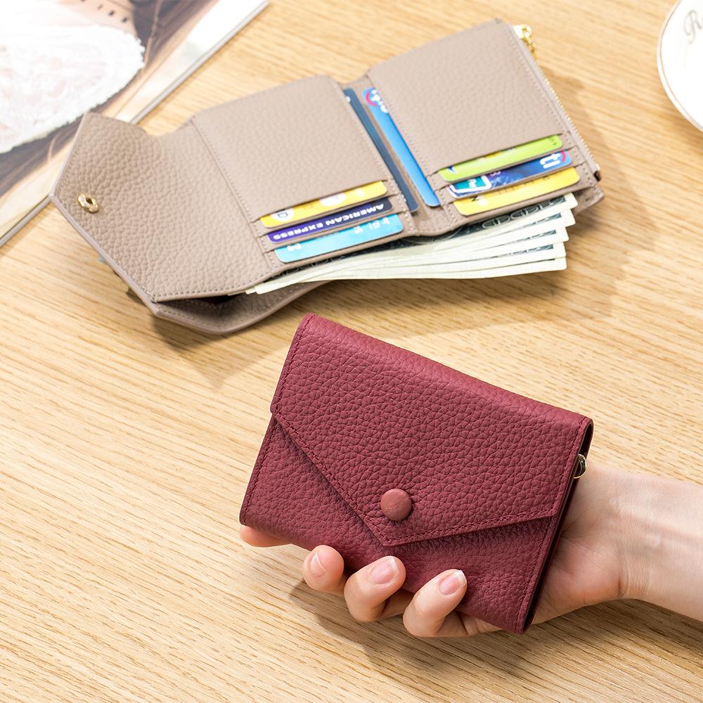 Women's three-fold short wallet, large-capacity fashionable portable wallet, Japanese and Korean multi-card card bag, change bag.