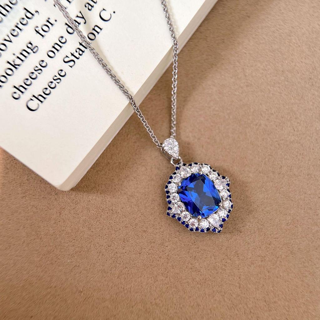 Elegant Set: Diamond-Inlaid Pendant, Blue Spinel Ring, and Stud Earrings with Imitation Royal Blue Sapphire for Women