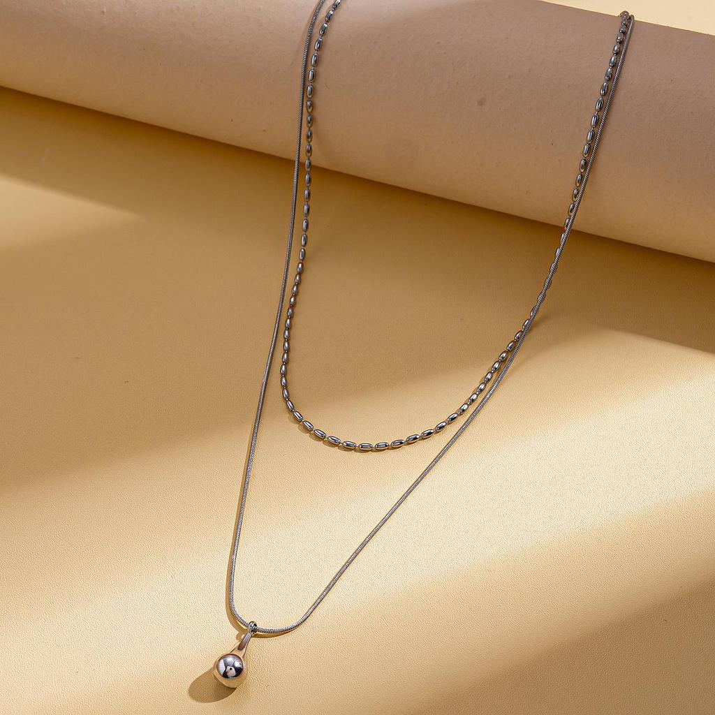 European & American Stainless Steel Double-Layer Water Drop Pendant Necklace - Fashionable Clavicle Chain for Women.