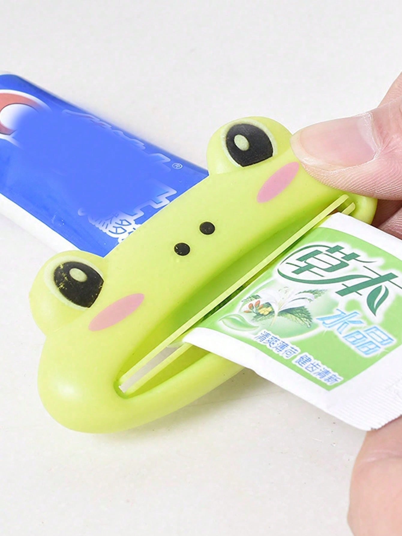 

1pc Cartoon Toothpaste Squeezer, Multi-Function Makeup Tool green