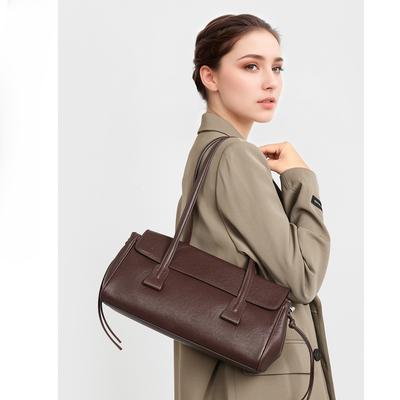 Unterarmtasche mit hochwertiger Haptik, Hand-Pillow-Damentasche und Single-Shoulder-Baguette-Tasche sind beliebt