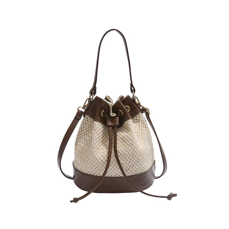 Hot Sale Contrasting Color Splicing Straw Pumping Bucket Bags Fashion Versatile Premium Holiday Wind Crossbody Women's Bags