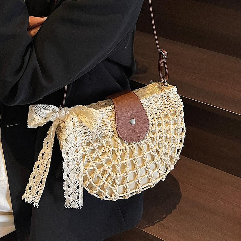 High-end literary niche hollow straw bag leisure foreign style seaside vacation beach messenger bag