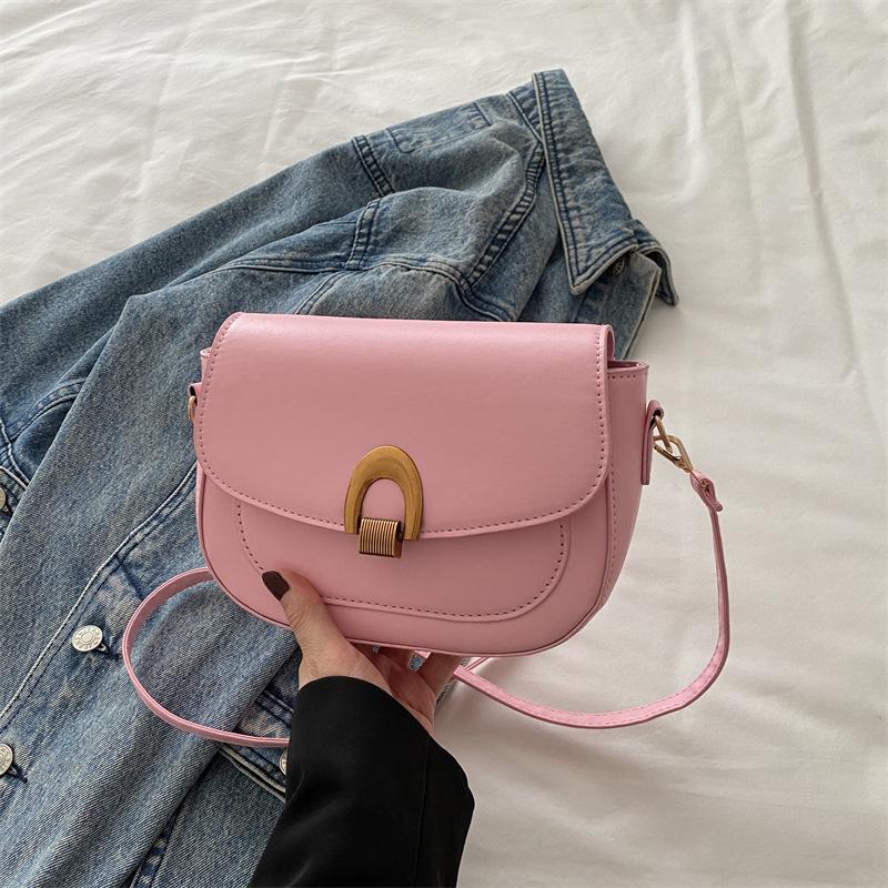 

Корейская текстурированная сумка-мессенджер женская 2025 ранняя весна новая повседневная дорожная наплечная сумка модный тренд дорожная сумка-седло розовый