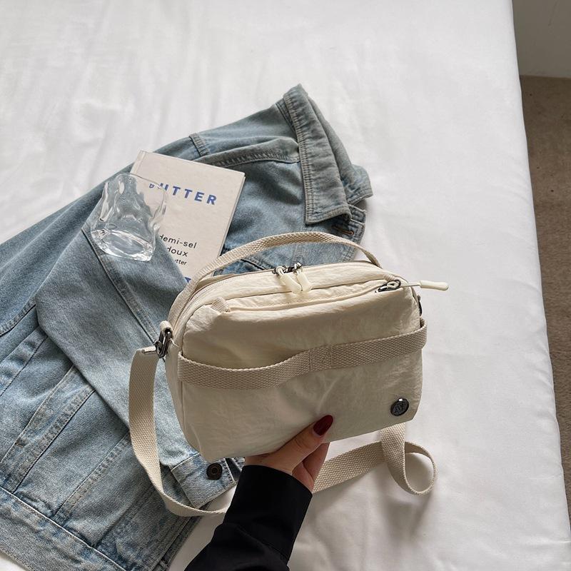 

Niche foreign style light and sweet and cool Mori small square bag 2025 autumn new fashionable simple solid color shoulder messenger bag