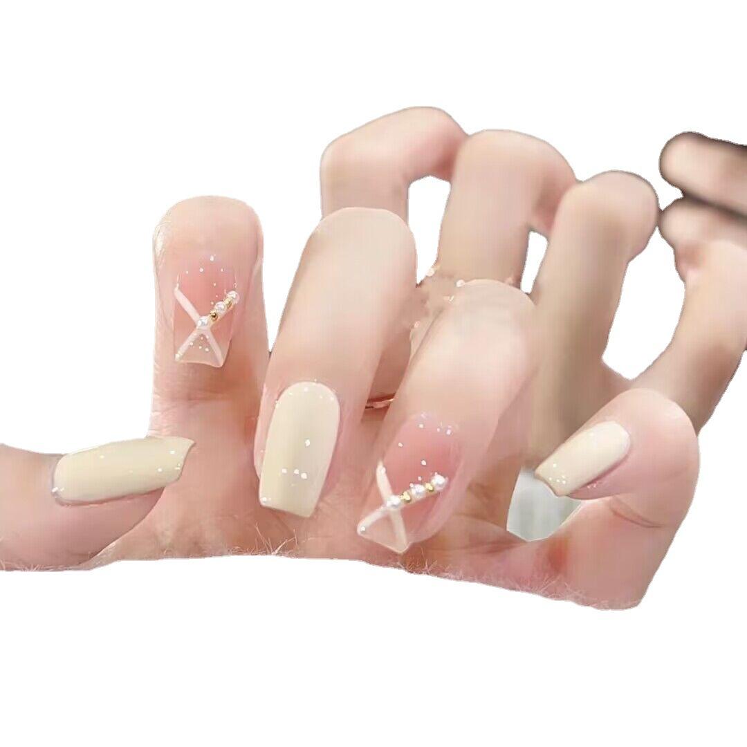 

Чисто ручная работа Фототерапия Носимая броня Покрытие Молоко с сыром Носимая броня Готовый продукт Многоразовый накладной ноготь large L