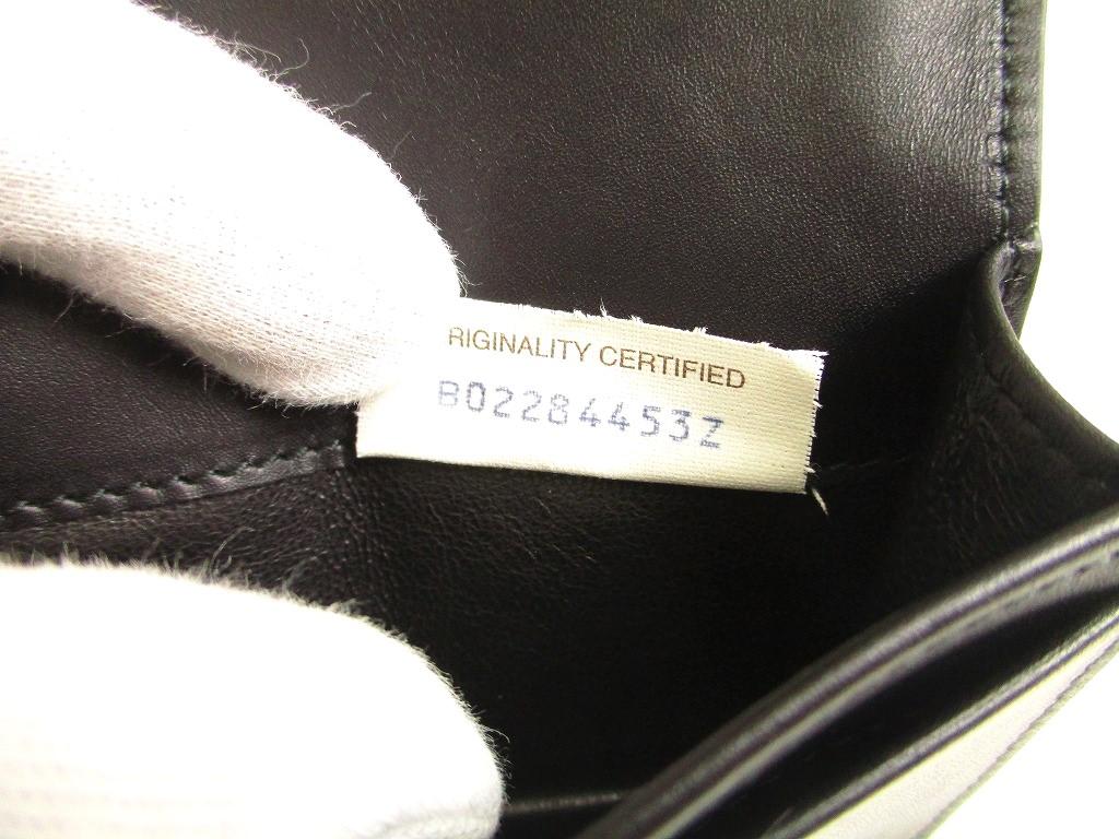 Подлинная визитница BOTTEGA VENETA Intrecciato из черной кожи #a063, восстановленная