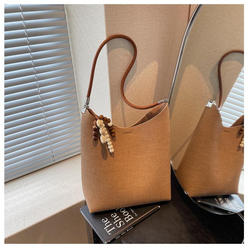 

Popular bag women s large-capacity new summer versatile shoulder mother and child bag simple bucket bag коричневый