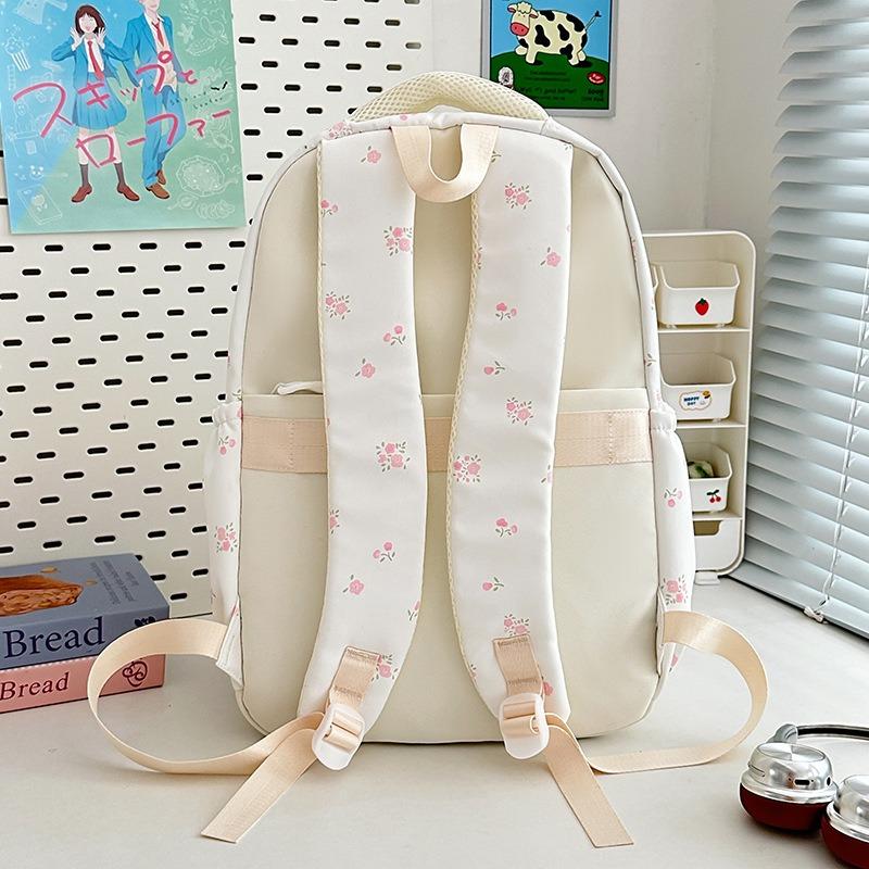 The new schoolbag is high-value, fresh and sweet floral backpack, and the lightweight spring outing backpack for junior high school students.