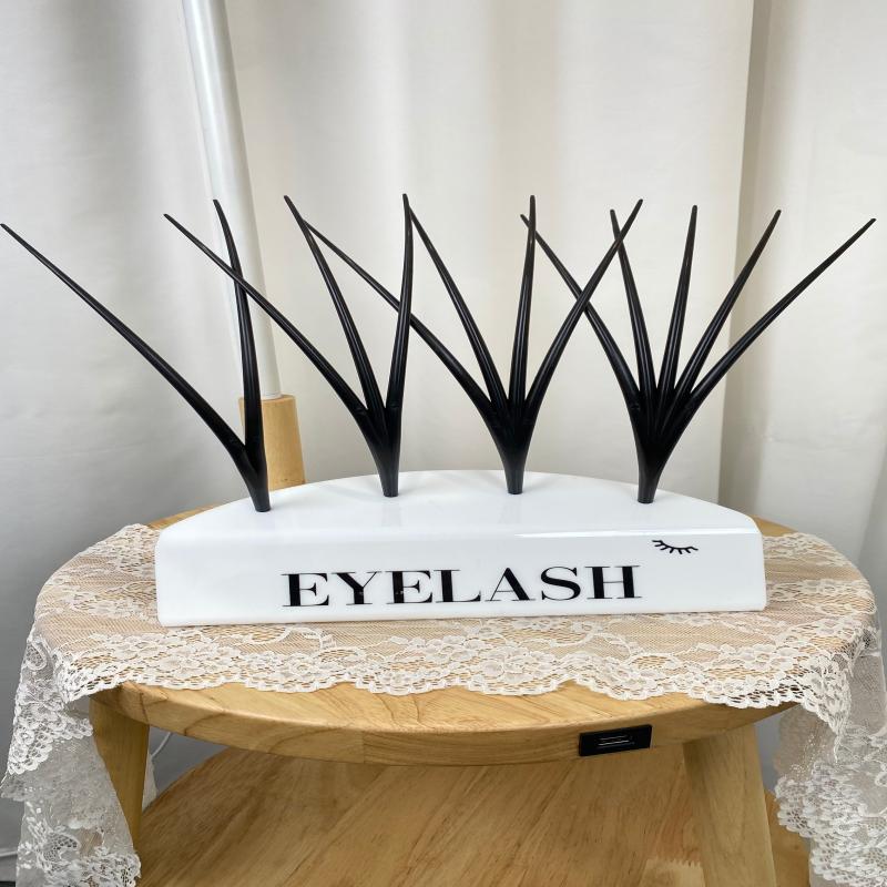 

Подставка для демонстрации наращенных ресниц Подставка для демонстрации при обучении наращиванию ресниц Профессиональное оформление магазина ресниц Модель ресниц