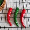 Green and Red Fake Chili Pepper Models for Display and Photography Props