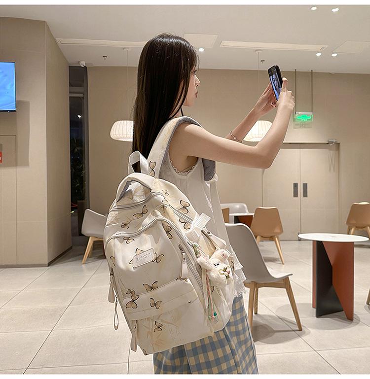 Dámský stylový lehký batoh: Školní a cestovní taška s velkou kapacitou a starobylým designem národního přílivu