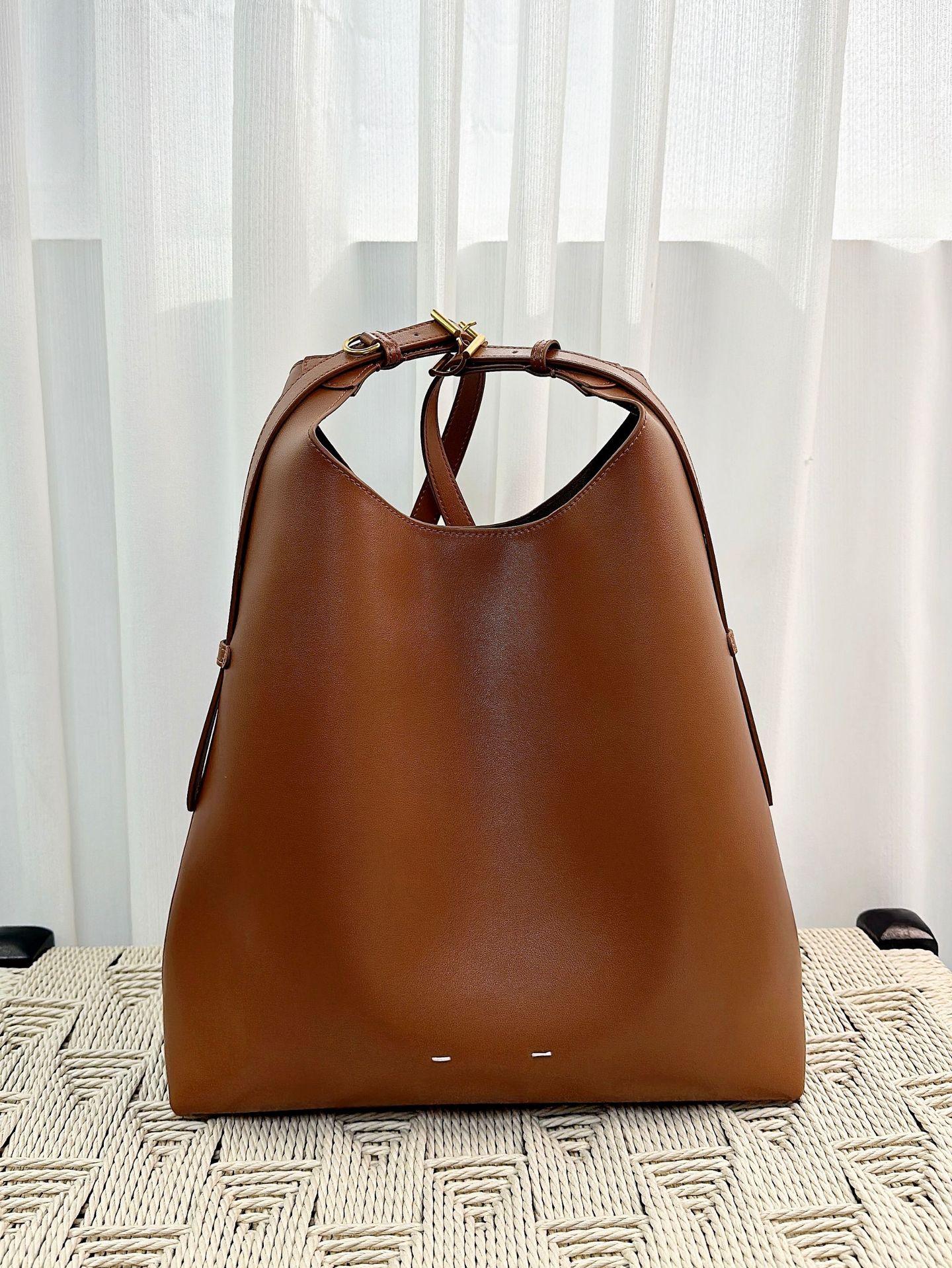 

New hobo drop ear tote bag large capacity bucket bag premium sense plain weave underarm bag commuter shoulder bag women 30*34*10cm коричневий