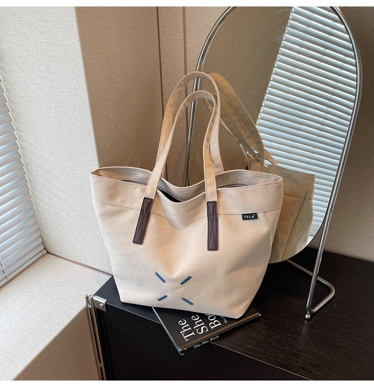 Canvas-Tasche Damen große Kapazität neu Sommer vielseitig schlichte Umhängetasche Studentin Tragetasche